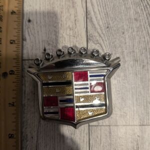 Cadillac Emblem with Red and Gold Accents